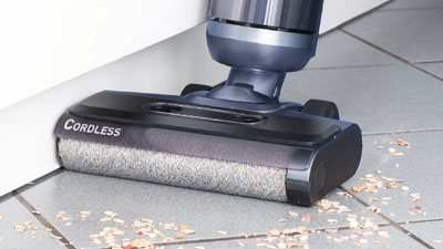 Washing the floor with clean water only. Thorough cleaning around edges and under walls