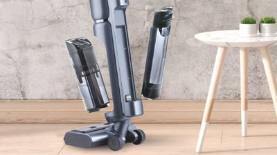 Saving space and time. The vacuum cleaner is conveniently parked on the charging station in an upright position