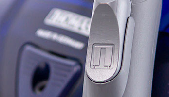Grey hose handle with a flap for mechanical suction power adjustment