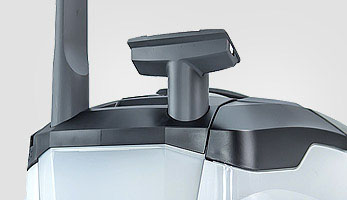 Convenient slots on the vacuum cleaner body for upholstery and crevice nozzles