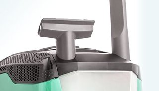 Multi Clean X10 Parquet, convenient slots on the vacuum cleaner body for upholstery and crevice nozzles